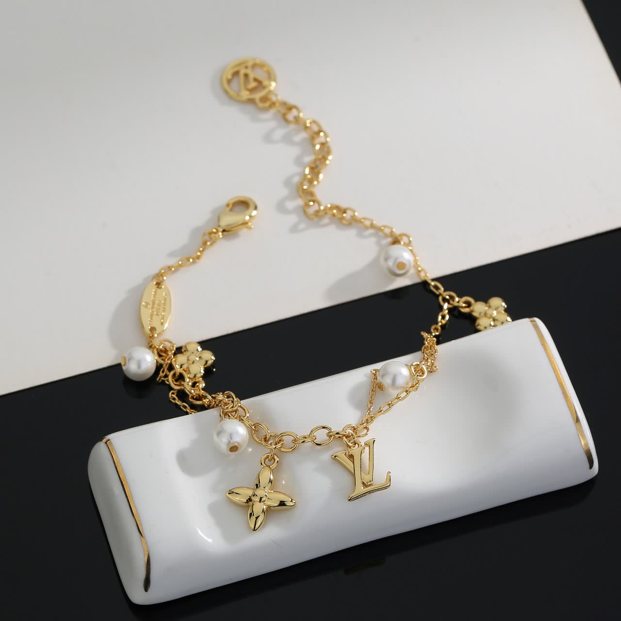 Louis Vuitton Gold Tone Bracelet with Pearls and Monogram